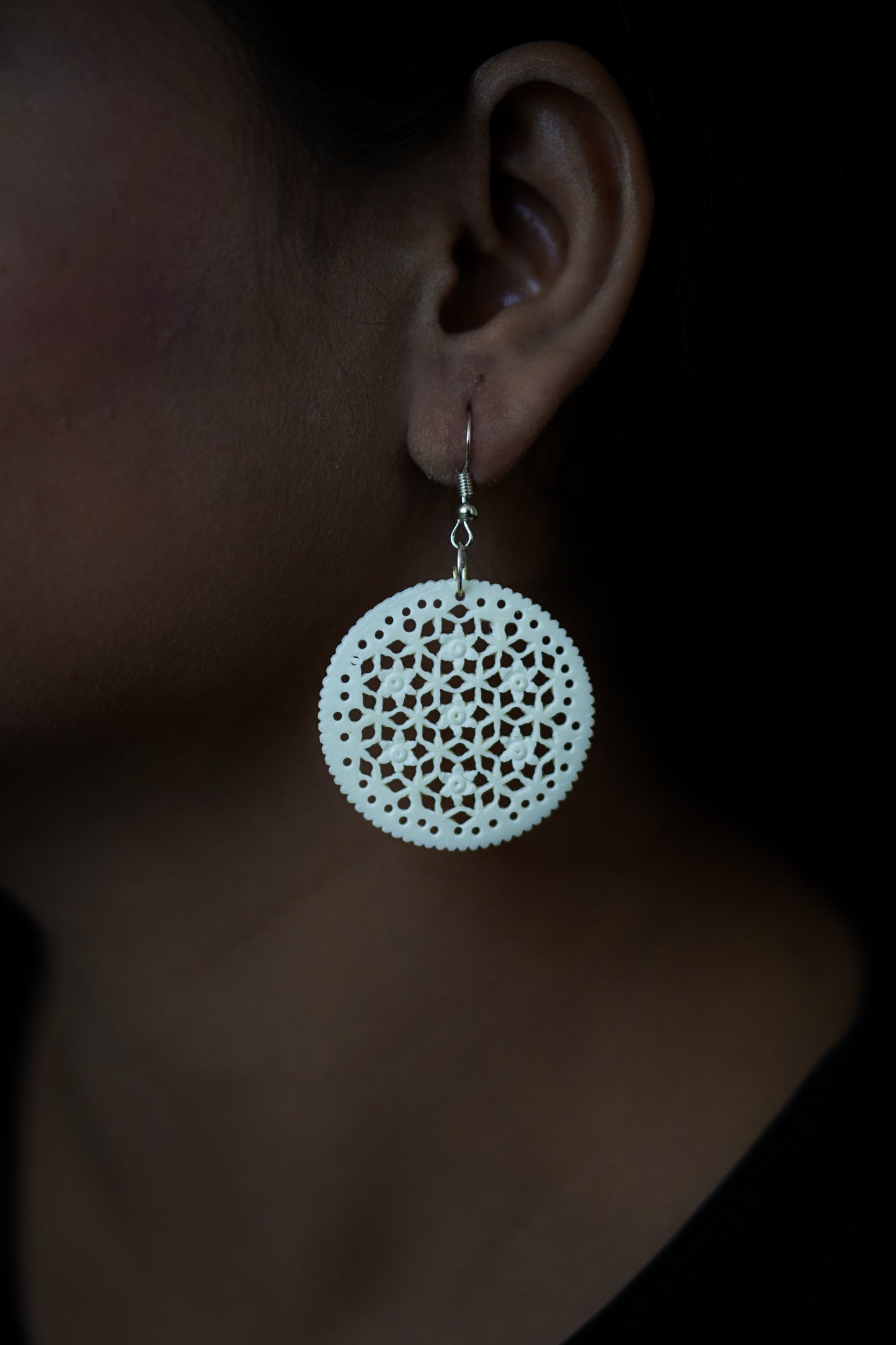 Intricate Impressions: Artisan Bone Carvings for Earrings