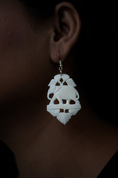 Whispers of Tradition: Artisanal Bone Carved Elephant Earrings