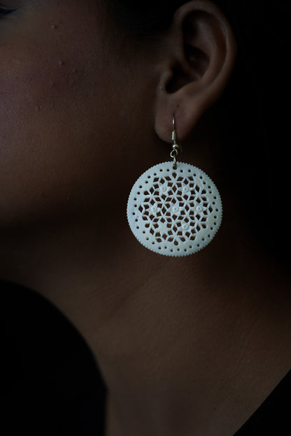 Intricate Impressions: Artisan Bone Carvings for Earrings