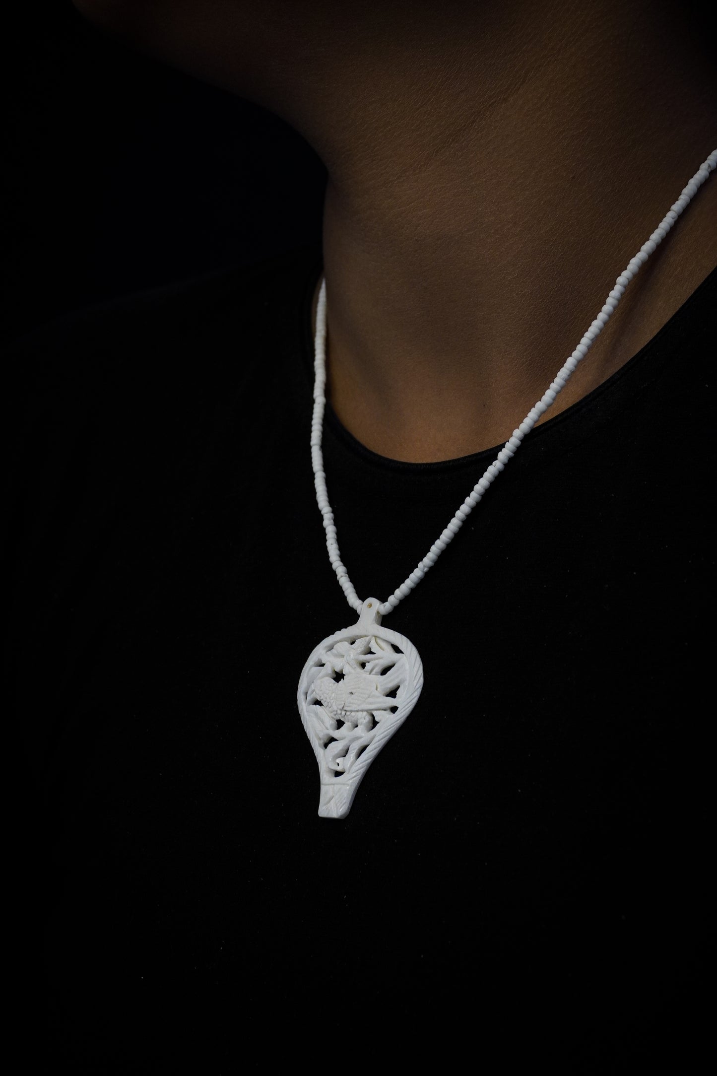 Spiritual Splendor: Artisan Bone Pendant