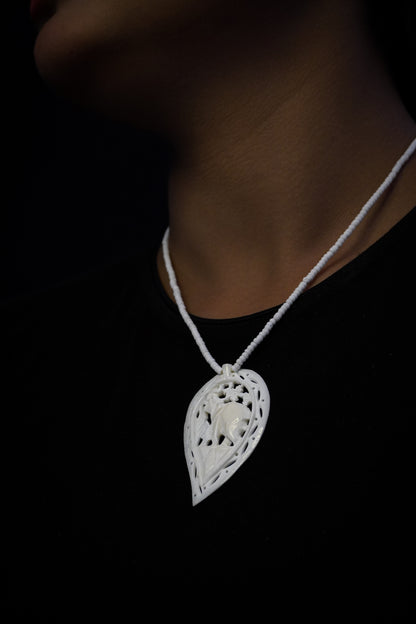 Fossilized Dreams: Unique Bone Necklace"