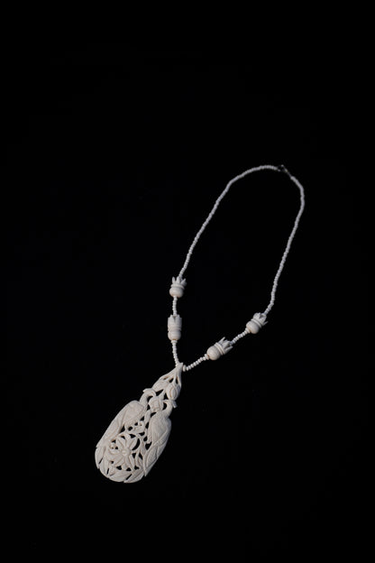 Ancient Echoes: Artisan Bone Necklace