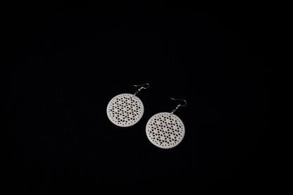 Intricate Impressions: Artisan Bone Carvings for Earrings