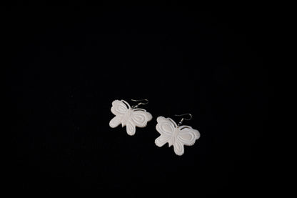 Tribal Treasures: Hand-Carved Bone Jewelry Butterfly Earrings