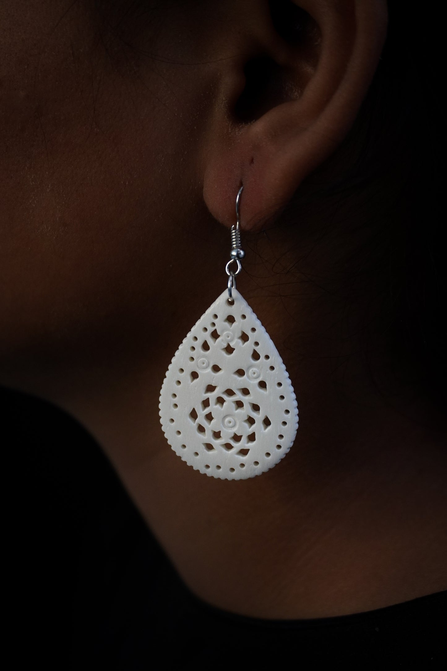 Harmony in Form: Handcrafted Bone Carving Dangle Earrings