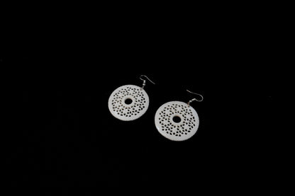 Cultural Reverence: Handcrafted Bone Symbol Earrings