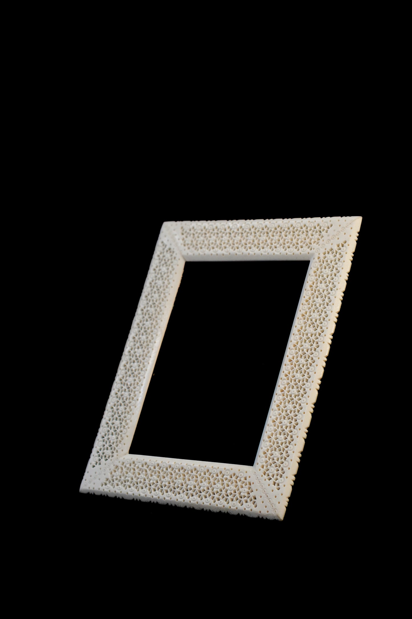 Elegance Unveiled: Artisan Bone Carved Frame