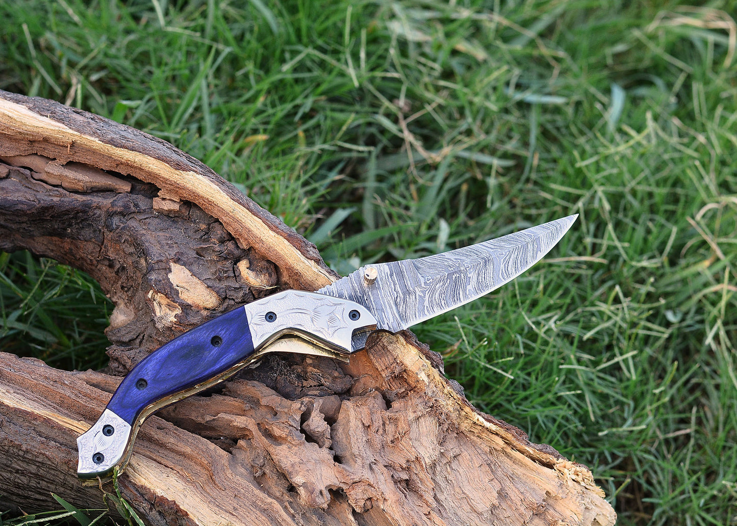 Innovative Folding Knife: Blue and Silver Accents